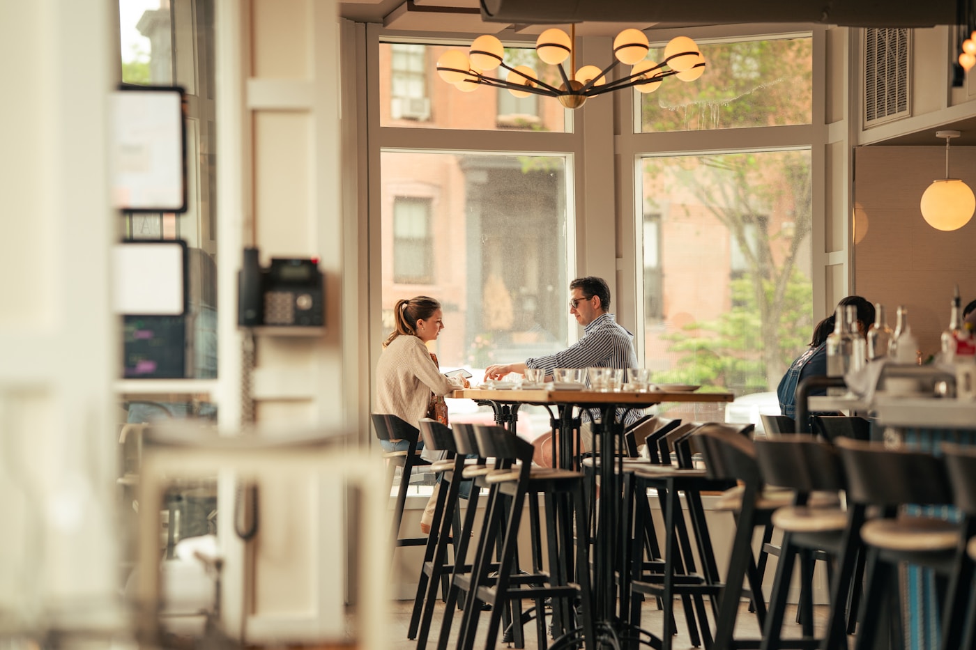 Two adults talking during a relaxed daytime date